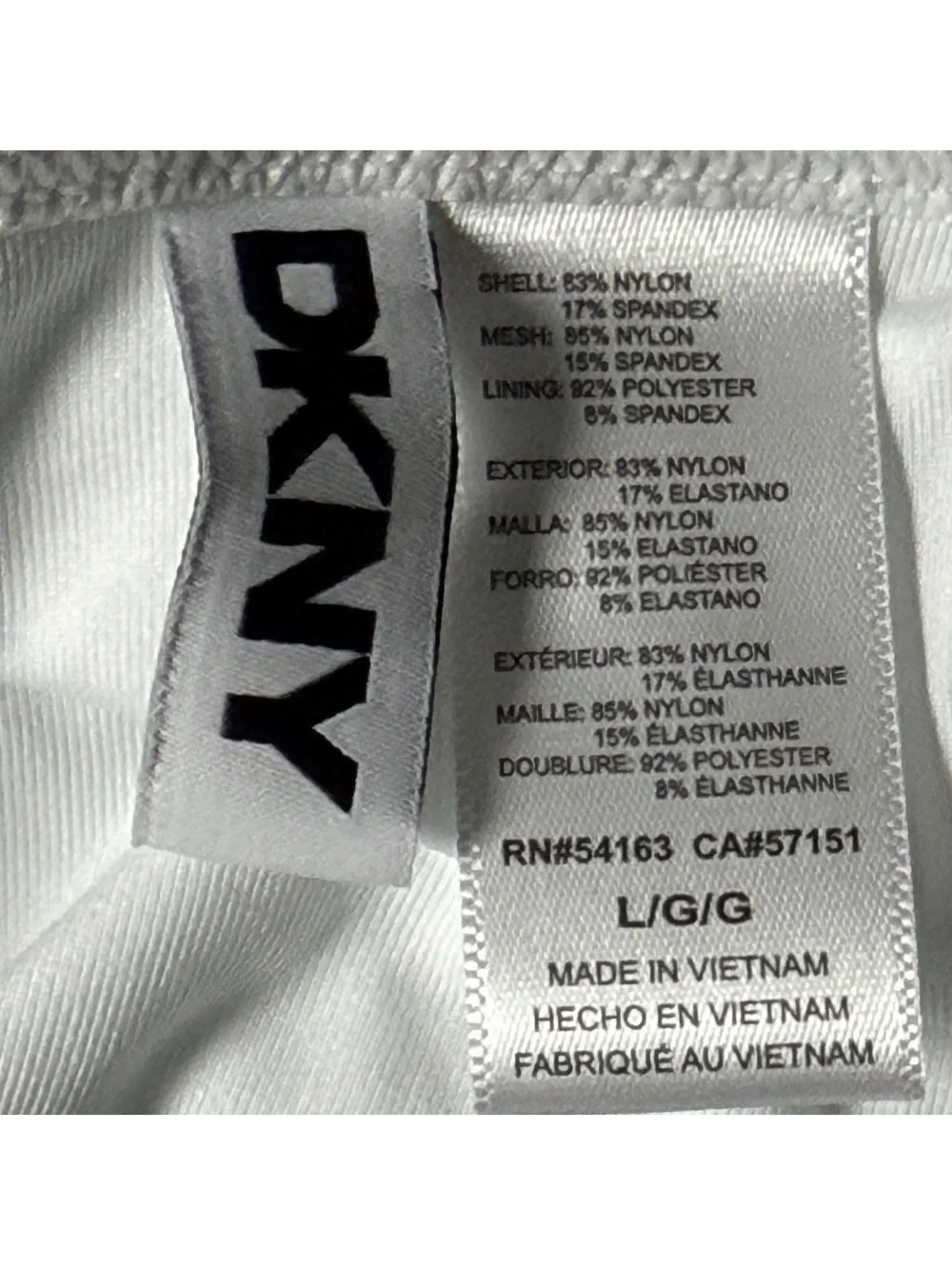 DKNY white strapless UPF 40+ stretch tummy control one piece swimsuit Size L $79